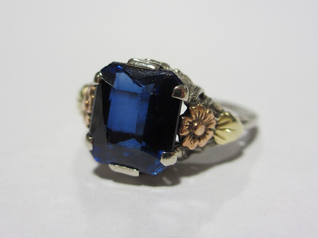 Appraisal: Synthetic sapphire ring in tri colour gold pierced and engraved