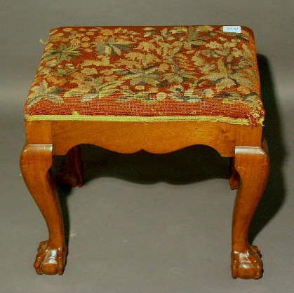 Appraisal: Chippendale style walnut footstool with ball and claw feet and