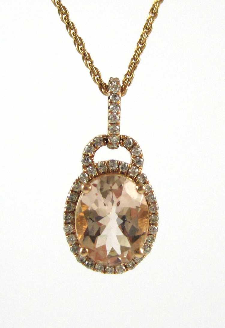 Appraisal: KUNZITE AND DIAMOND PENDANT NECKLACE suspended on a inch k