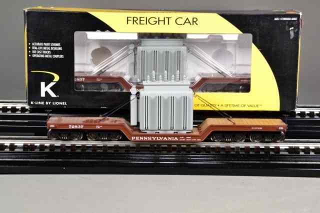 Appraisal: K-LINE LIONEL PENN FREIGHT CARSTwo K-Line Lionel maroon Pennsylvania freight