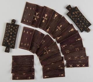 Appraisal: Unusual Group of Twenty Wooden Cards with Carved Symbols Possibly