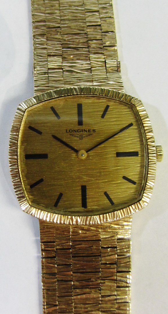 Appraisal: A gentleman's ct gold Longines bracelet wristwatch the curved rectangular