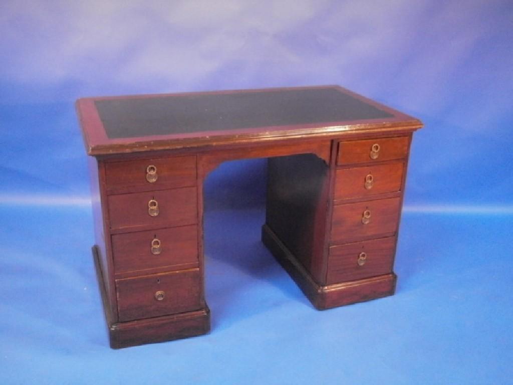 Appraisal: A late thC mahogany pedestal desk fitted with graduated drawers