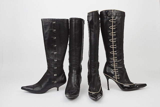 Appraisal: Two pairs of black pointed Alexander McQueen boots the first