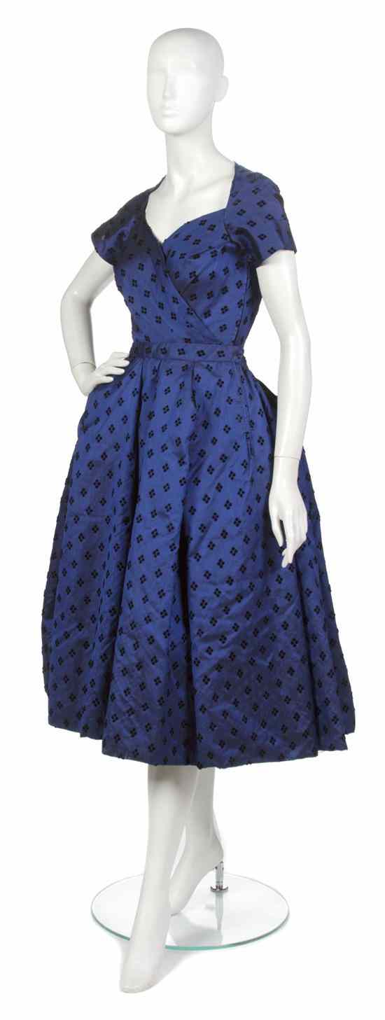 Appraisal: A Mainbocher Blue Silk Dress full circle skirt with black