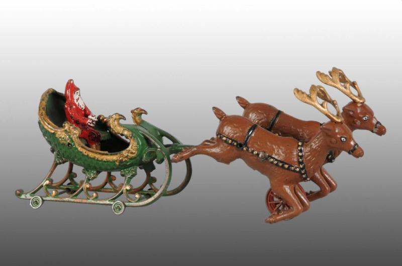 Appraisal: Cast Iron Hubley Santa Sleigh Toy with Reindeer Description Toy