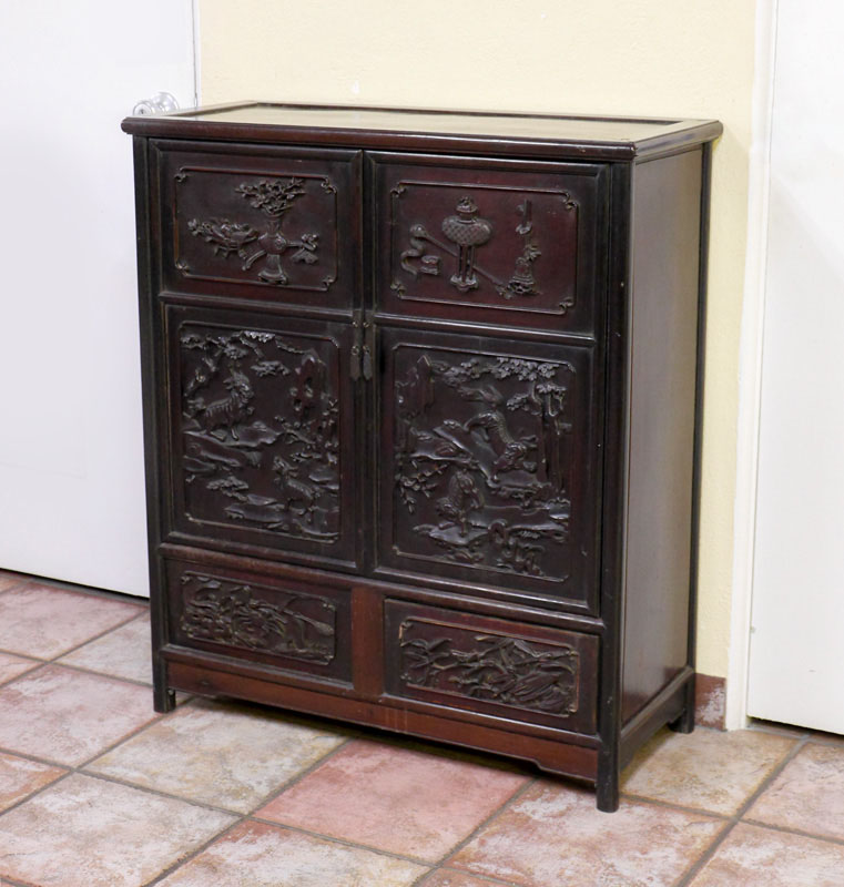 Appraisal: CHINESE CARVED SIDE CABINET Through tenon construction doors over drawers