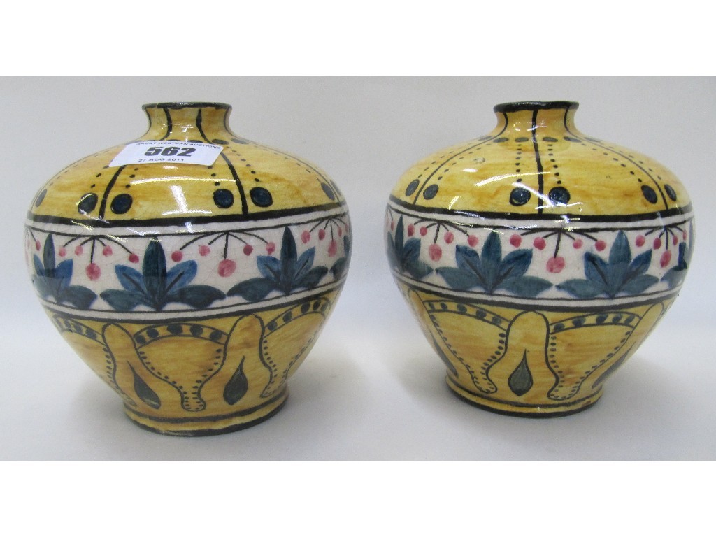 Appraisal: Pair of pottery vases with stylised decoration with names J