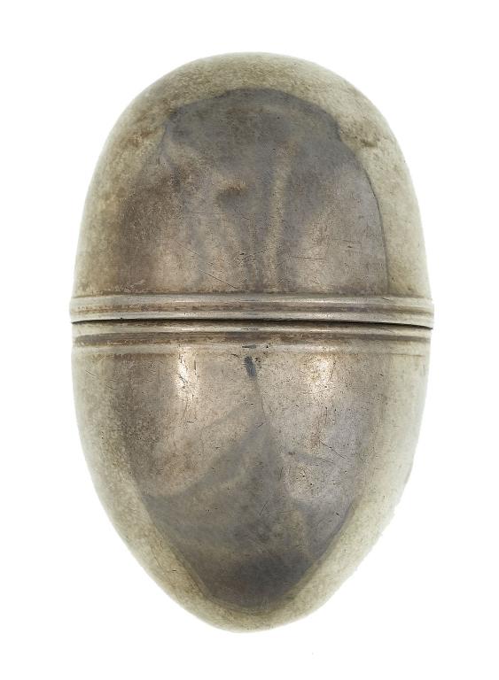 Appraisal: A GEORGE III SILVER NUTMEG GRATER of egg shape cm