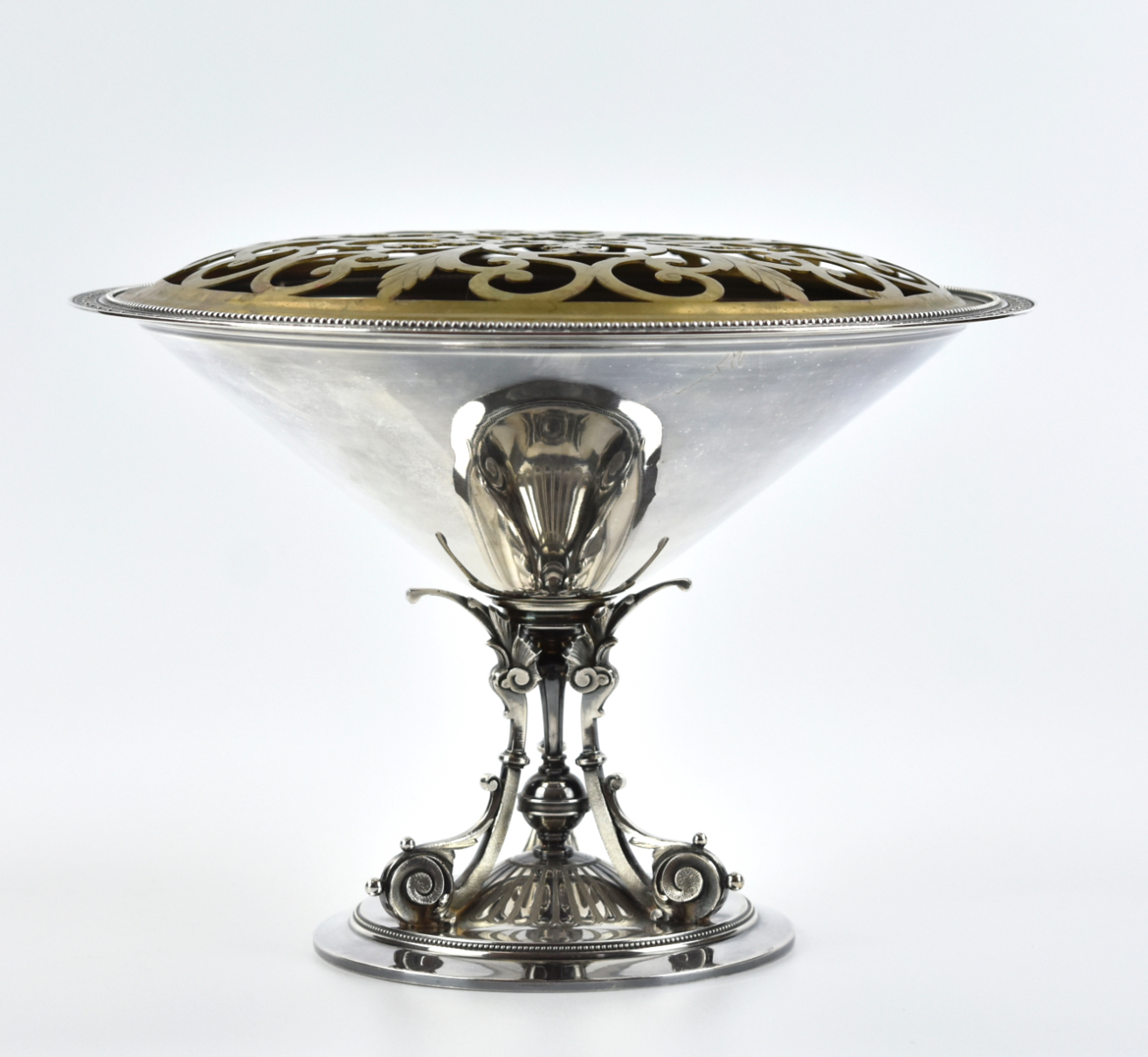 Appraisal: Tiffany Co silver plate supported by three foliate scrolls on