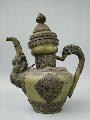 Appraisal: A Sino-Tibetan brass kettle the spout modelled as an elephant's