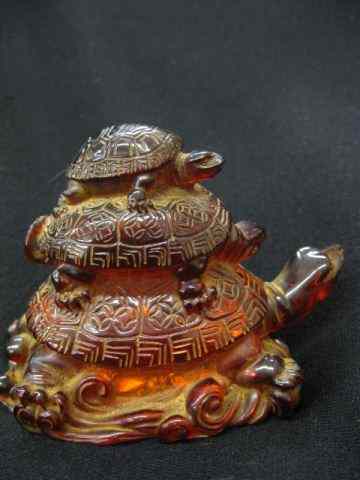 Appraisal: Amber Figurine of Three Turtles '' excellent