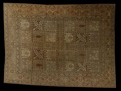 Appraisal: TABRIZ CARPET Incorporating floral tiles in tones of tan oatmeal