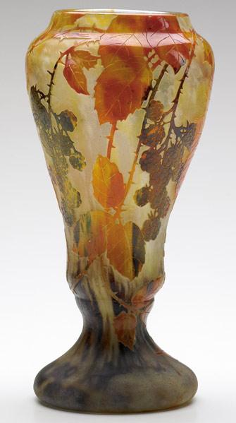 Appraisal: DAUM Colorful cameo glass footed vase with black berries and