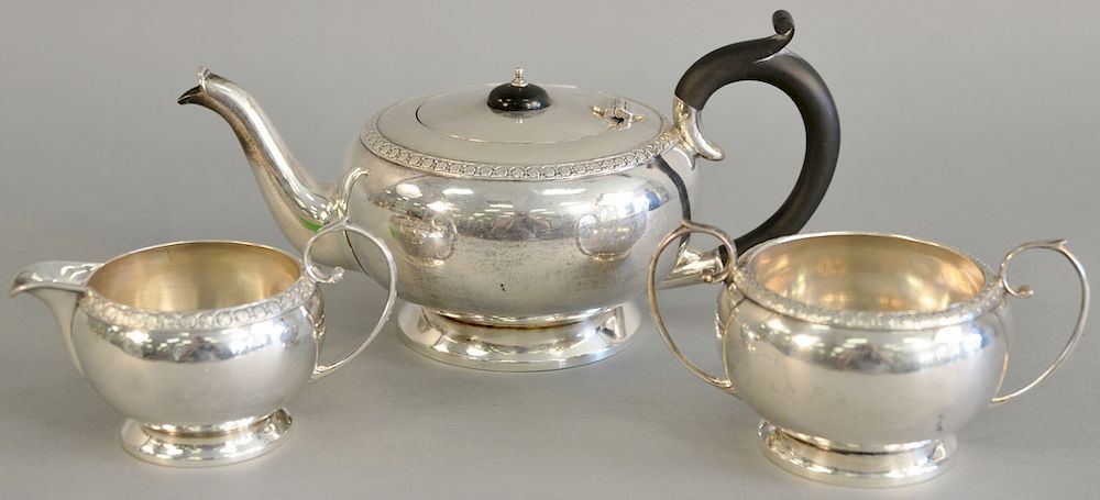 Appraisal: English silver three piece tea set with tea pot sugar