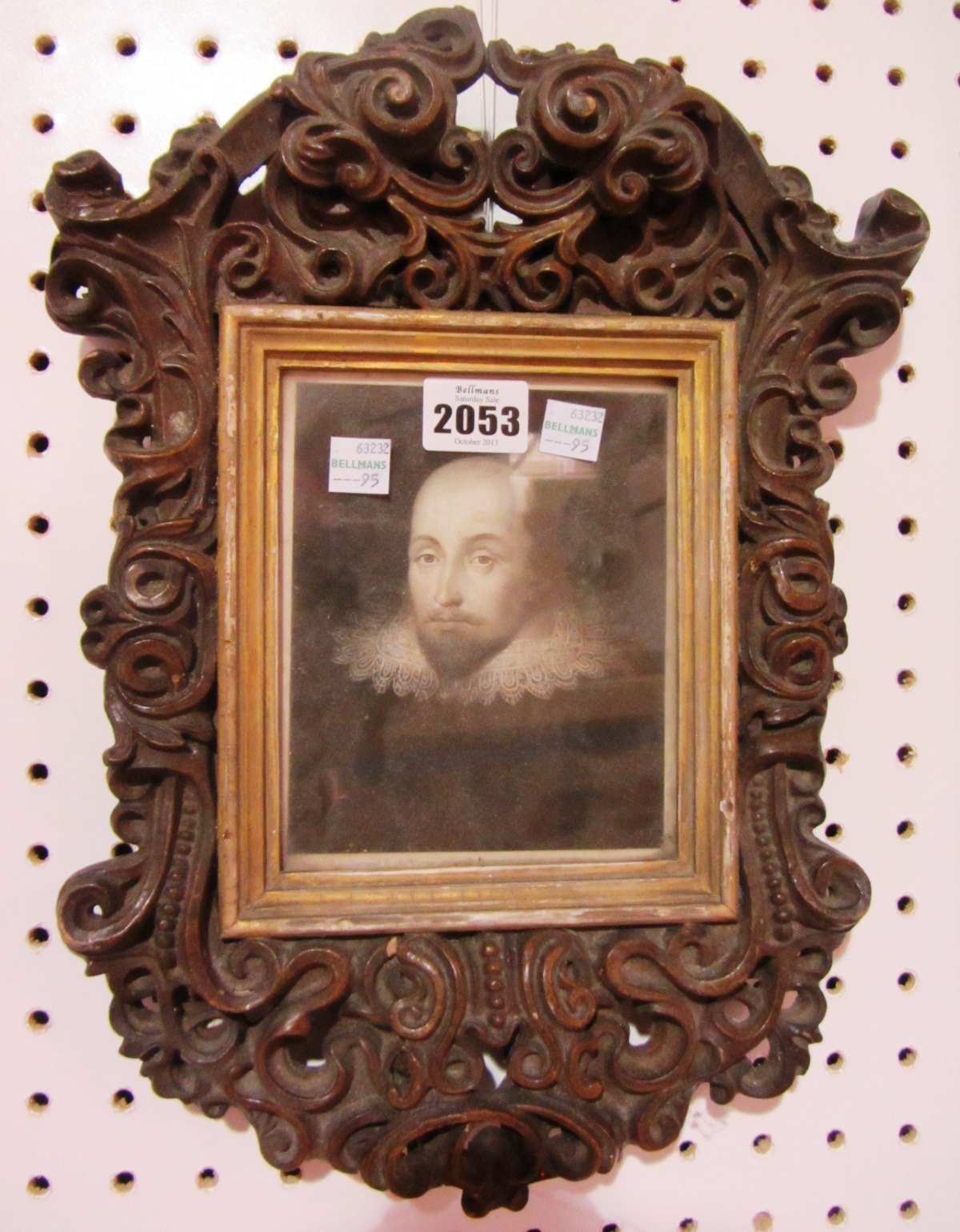 Appraisal: A foliate moulded plaster frame containing an engraving of Shakespeare