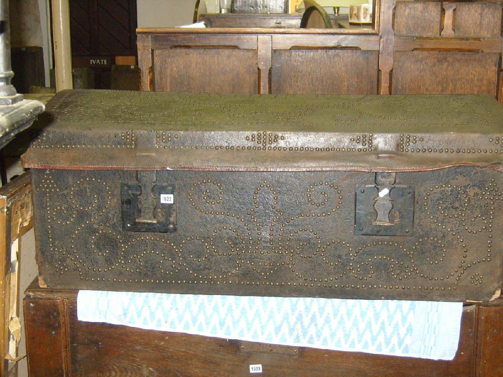 Appraisal: A substantial Georgian leather bound dome topped trunk with stud