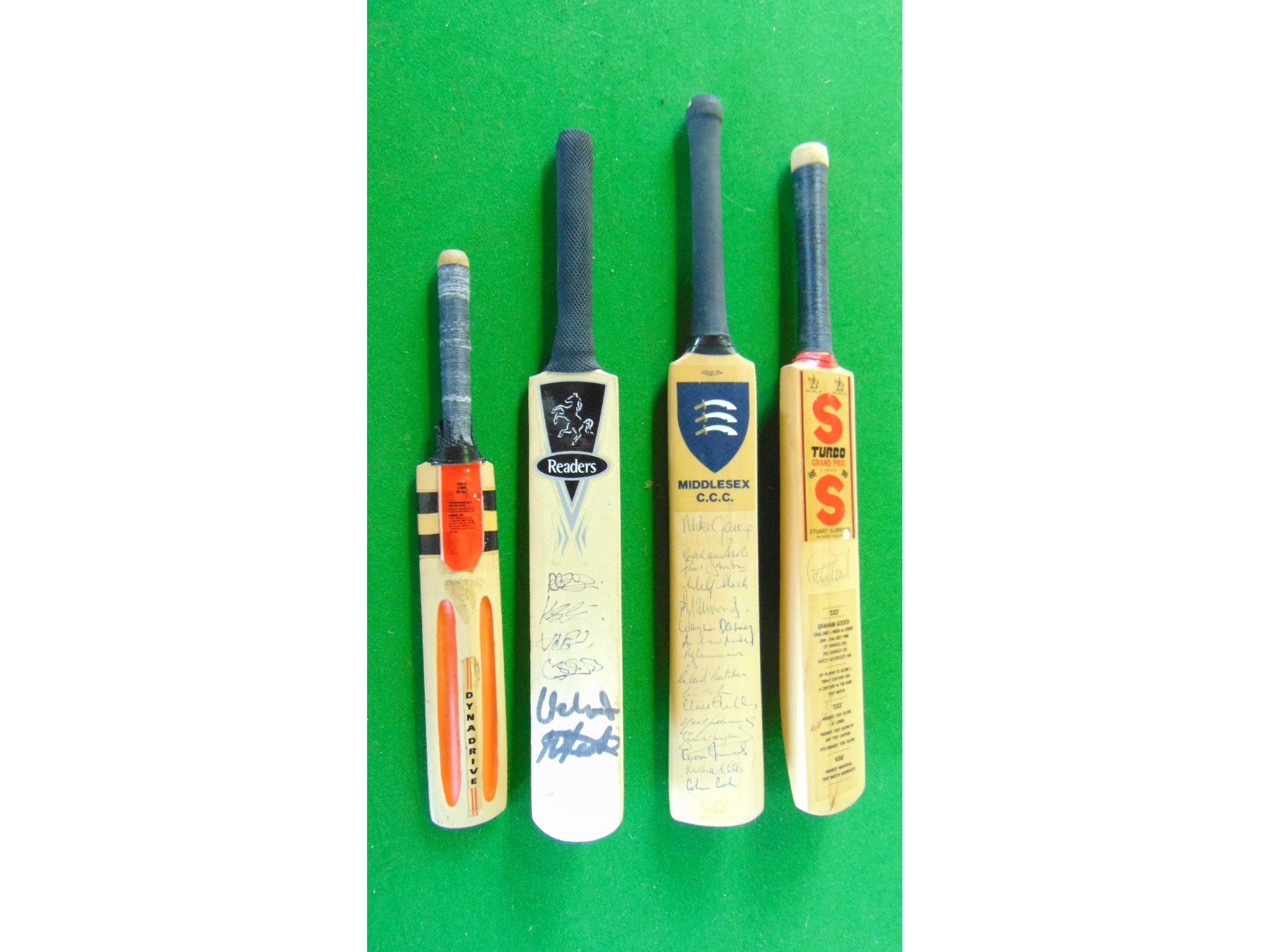 Appraisal: Three miniature cricket bats including an example signed by Graham