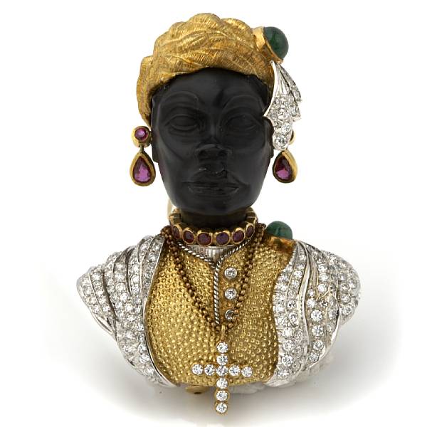 Appraisal: A diamond ruby emerald and carved ebony blackamoor brooch Italy