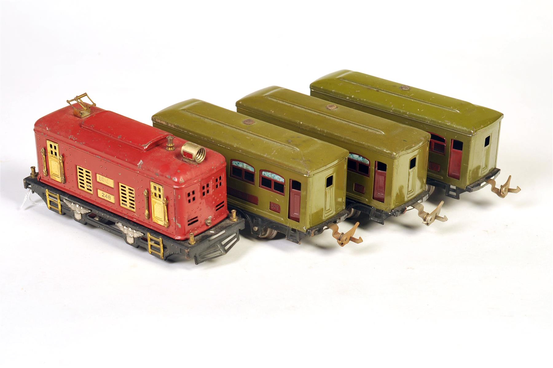 Appraisal: LIONEL O GAUGE FOUR-PIECE PASSENGER CONSIST INCLUDING ELECTRIC AND THREE