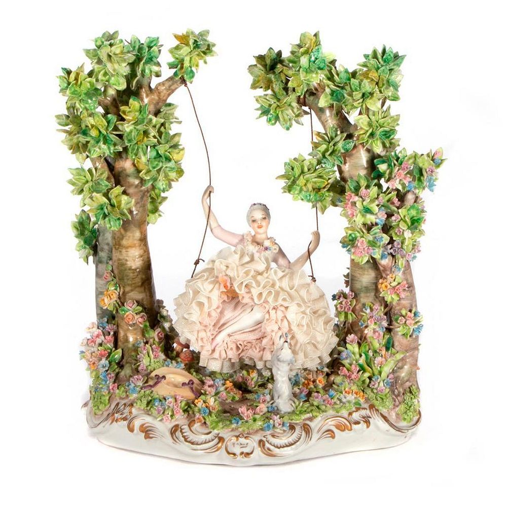 Appraisal: Dresden porcelain maiden on a swing A vintage Dresden porcelain