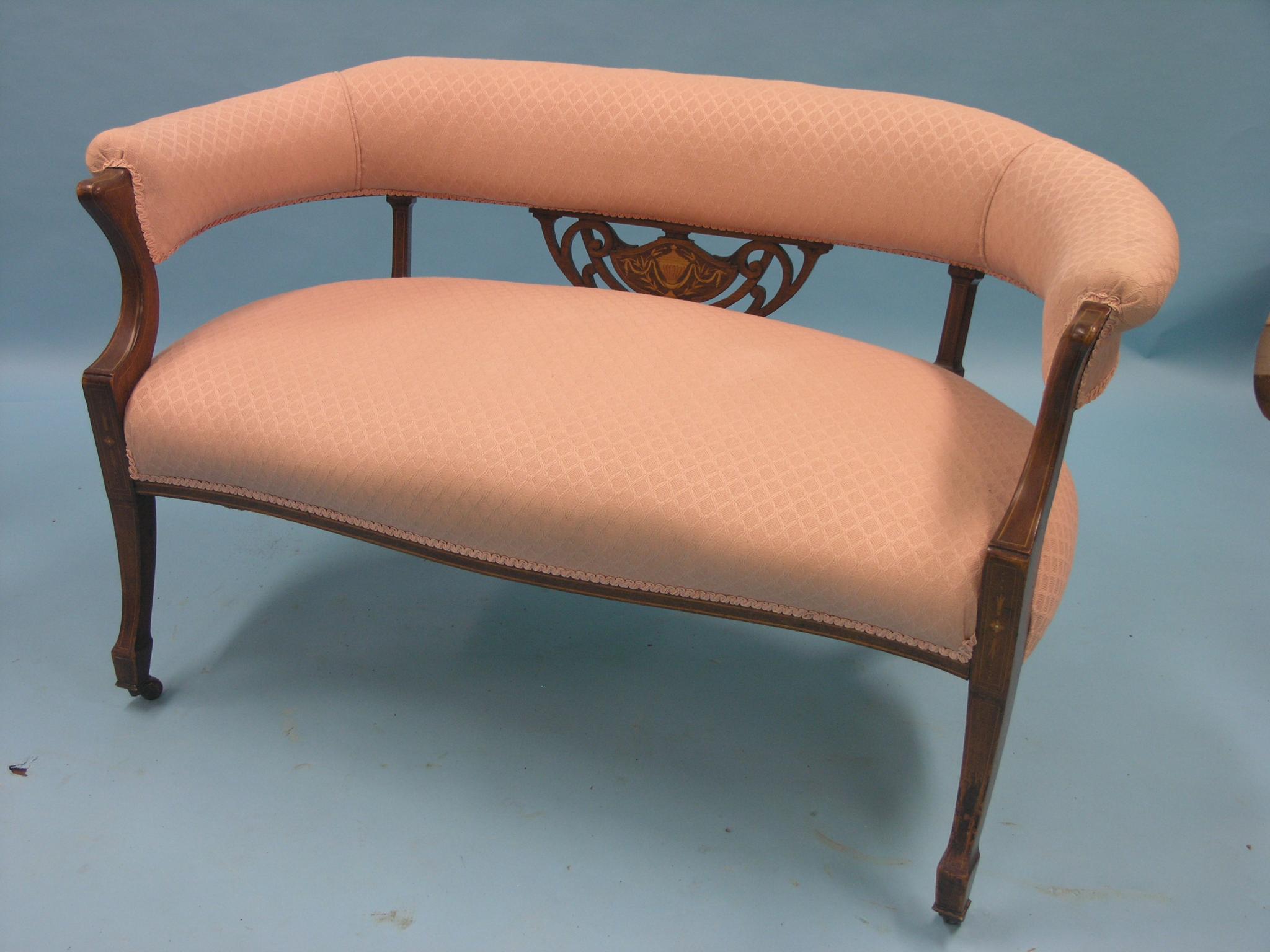 Appraisal: An Edwardian two-seater settee inlaid mahogany frame upholstered in a