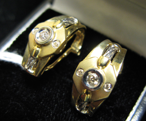 Appraisal: PAIR OF DIAMOND AND FOURTEEN KARAT GOLD EARRINGS each set