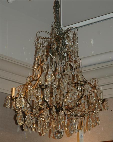 Appraisal: Louis XV Style Patinated-Metal and Cut Glass Twelve-Light Chandelier Estimate