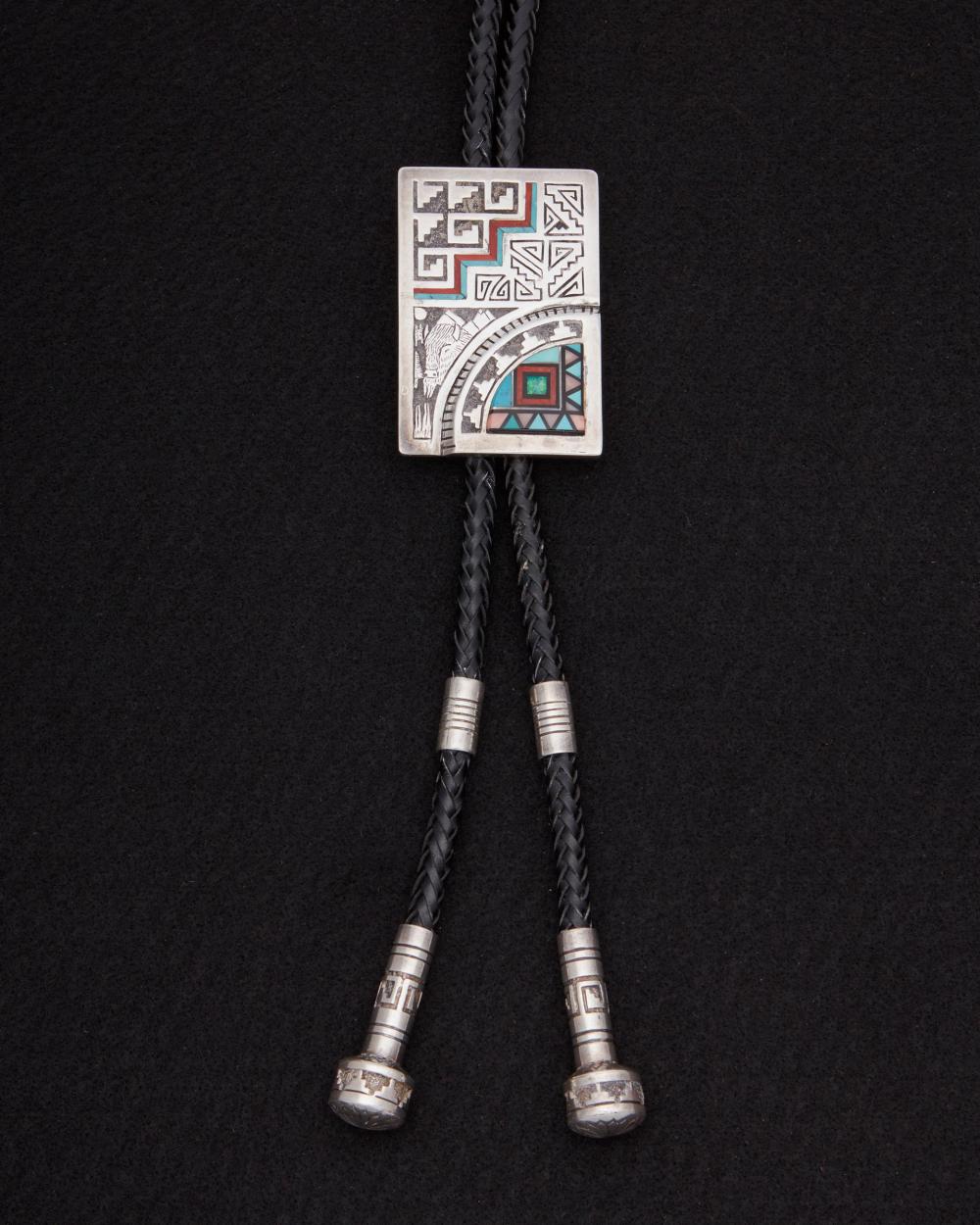 Appraisal: An Abraham Begay inlaid sandcast sterling bolo tie Second half