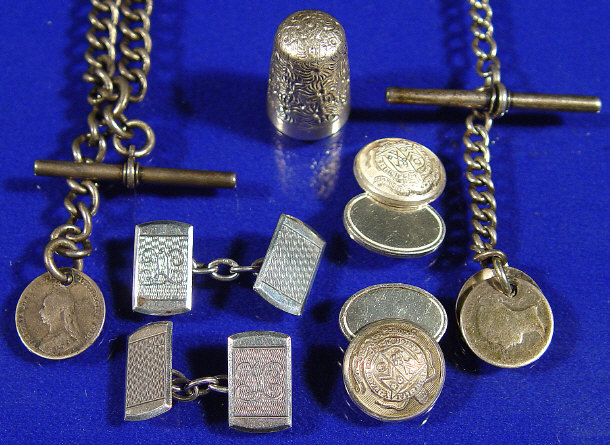 Appraisal: Two silver watch chains two pairs of silver cufflinks and