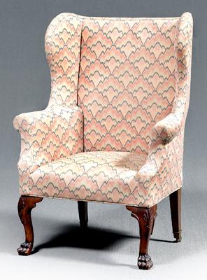 Appraisal: Irish Chippendale carved wing chair mahogany with shell carved cabriole