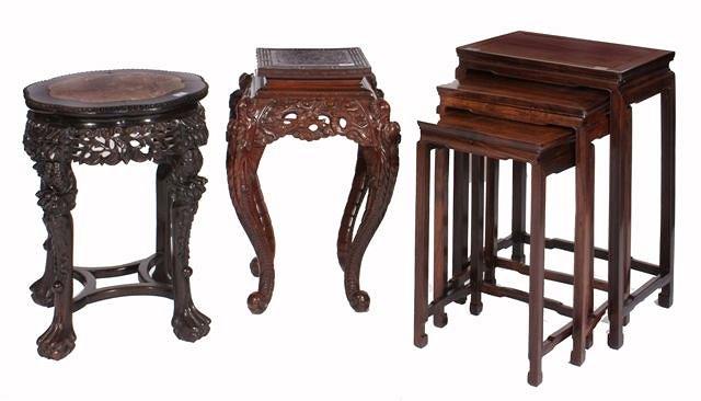 Appraisal: A NEST OF THREE CHINESE PADOUK OCCASIONAL TABLES with moulded