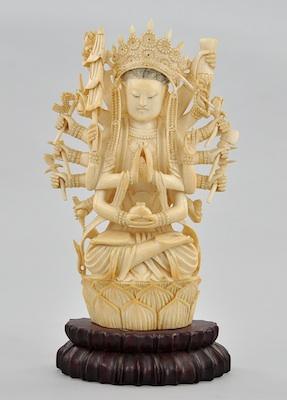 Appraisal: A Carved Ivory Seated Indian Deity Open work carved seated