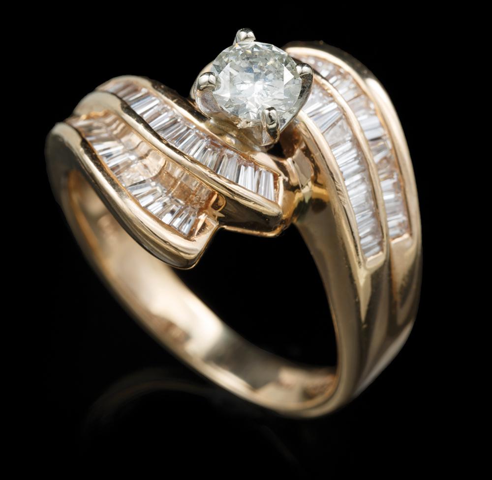 Appraisal: kt Yellow Gold and Diamond Ring center prong set round