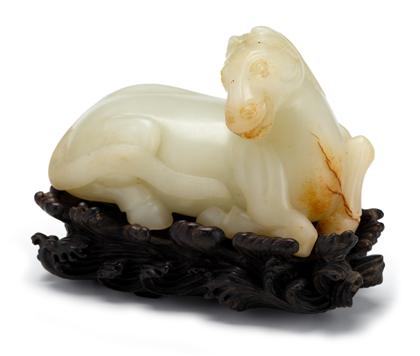 Appraisal: Chinese white jade carving of a horse th century Recumbent