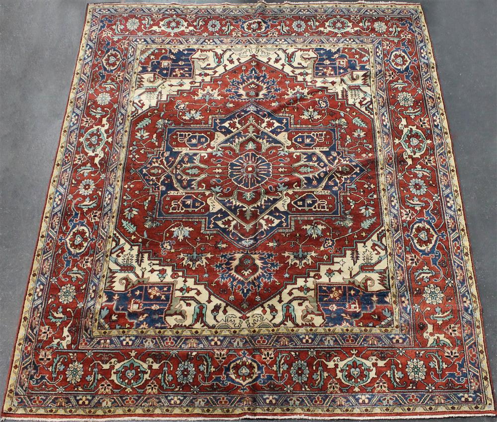 Appraisal: LARGE HERIZ WOOL RUG central medallion surrounded by multiple motifs