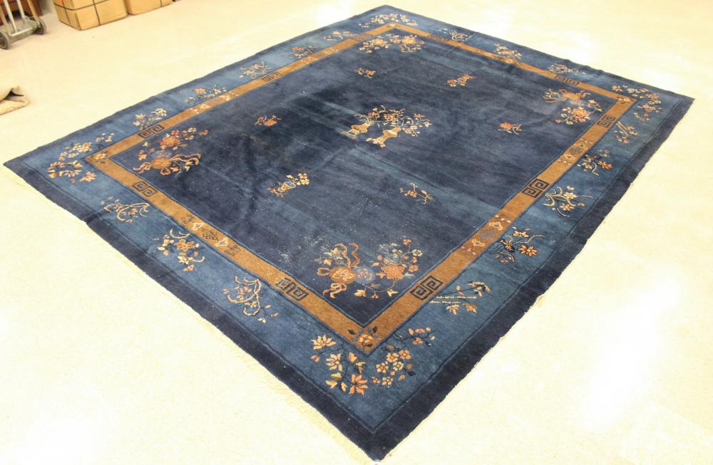 Appraisal: SEMI-ANTIQUE CHINESE CARPET hand knotted in traditional Peking design on