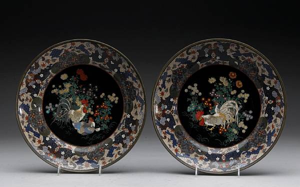 Appraisal: A pair of cloisonn enamel decorated plates Meiji Period Each