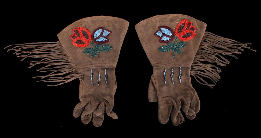 Appraisal: Crow Indian Floral Beaded Gauntlets This is a pair of