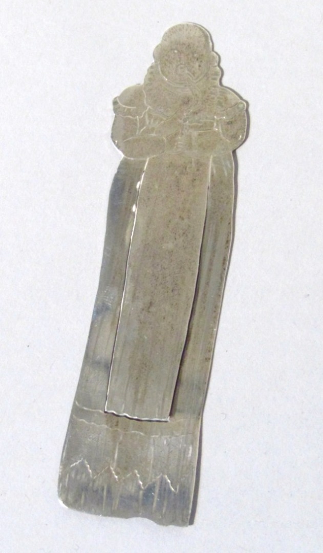 Appraisal: A Victorian silver figural bookmark of shaped articulated form cm