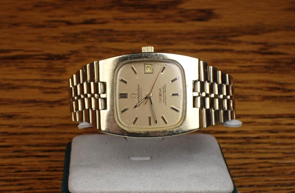 Appraisal: VINTAGE OMEGA CONSTELLATION AUTOMATIC CHRONOMETER having brushed gold color rectangular