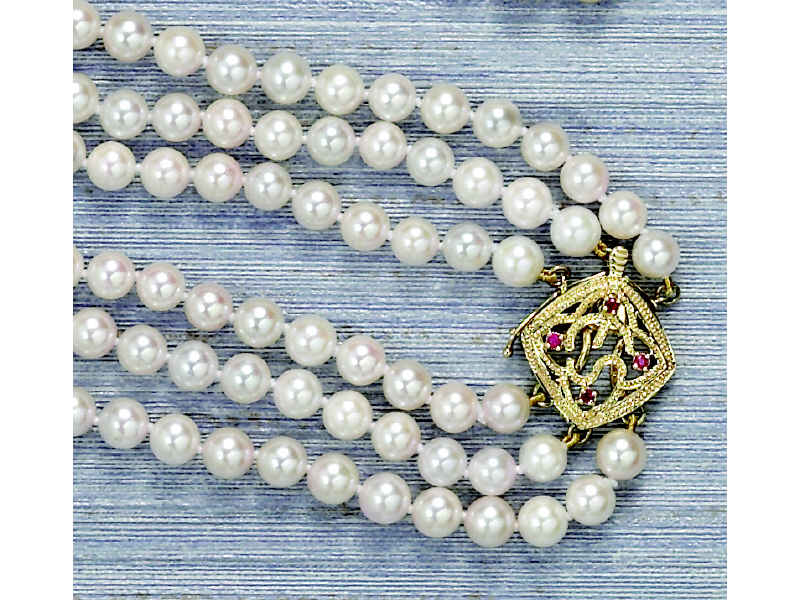 Appraisal: TRIPLE STRAND PEARLS White pearls measuring mm with good luster