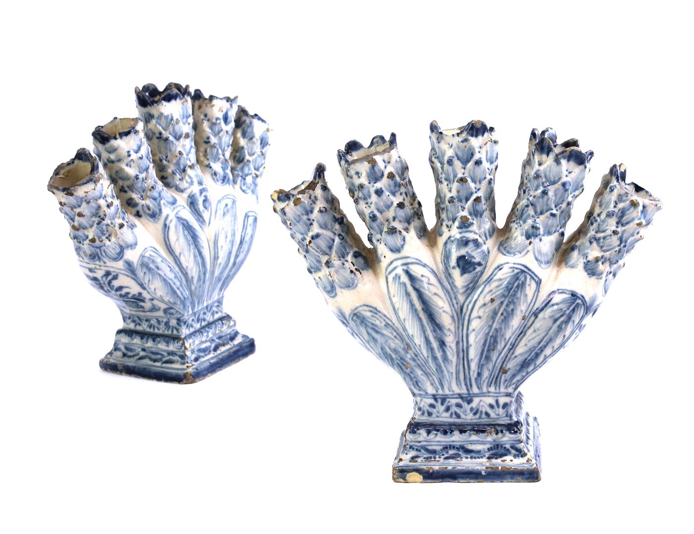 Appraisal: A pair of Continental faience blue and white tulipieres late