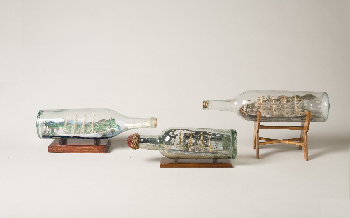 Appraisal: FRENCH FOUR-MASTED SHIP MODEL IN A BOTTLE The barque flying