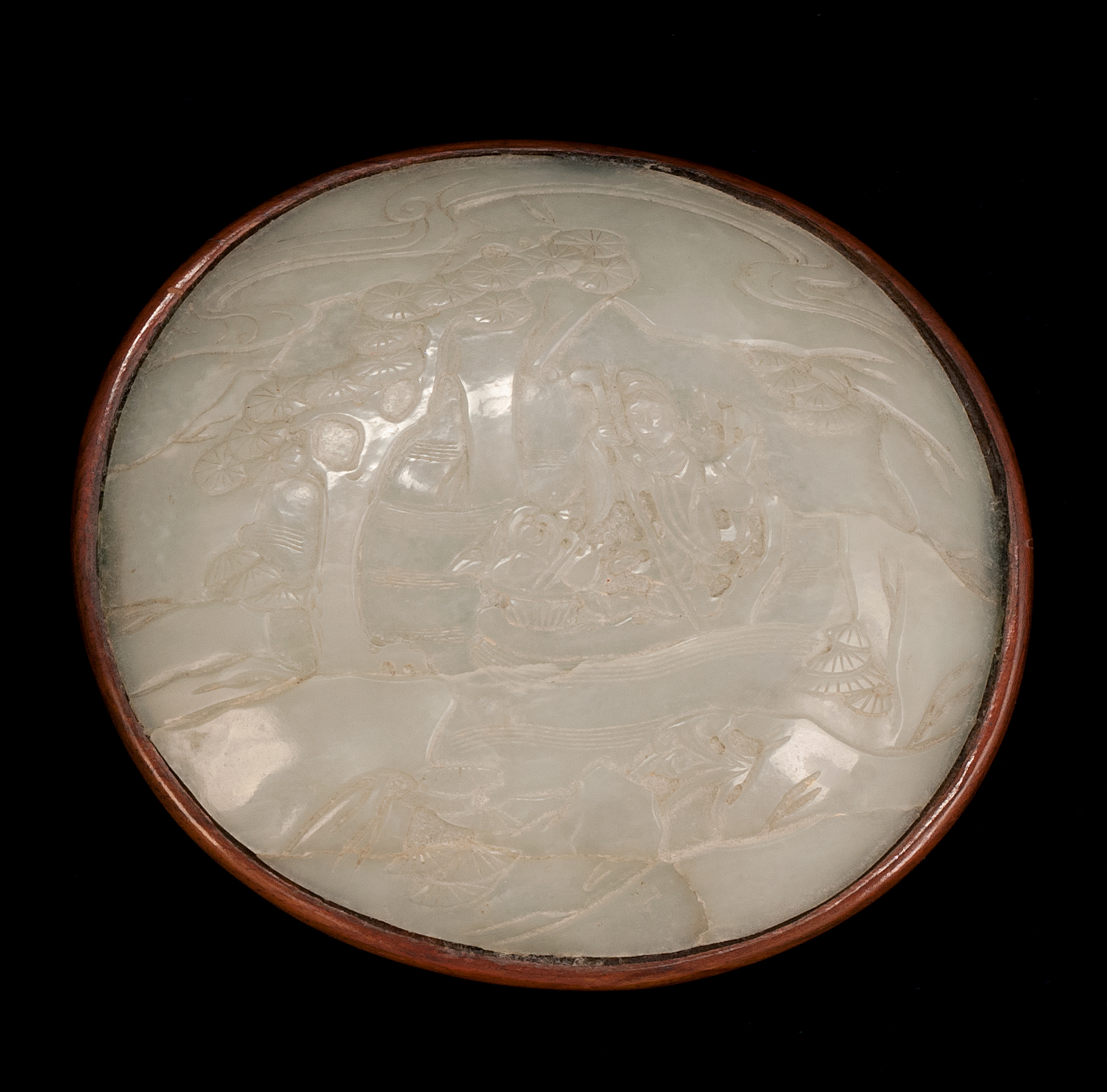 Appraisal: WHITE JADE OVAL PLAQUE th CenturyWith carved decoration of Shoulao