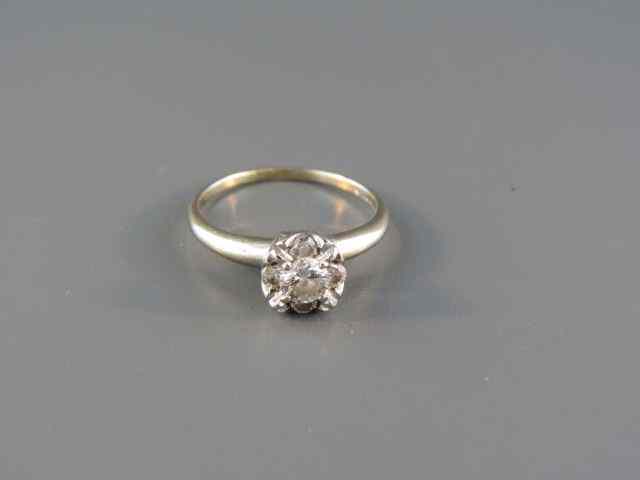 Appraisal: Diamond Ring round brilliant diamond with four around it carat