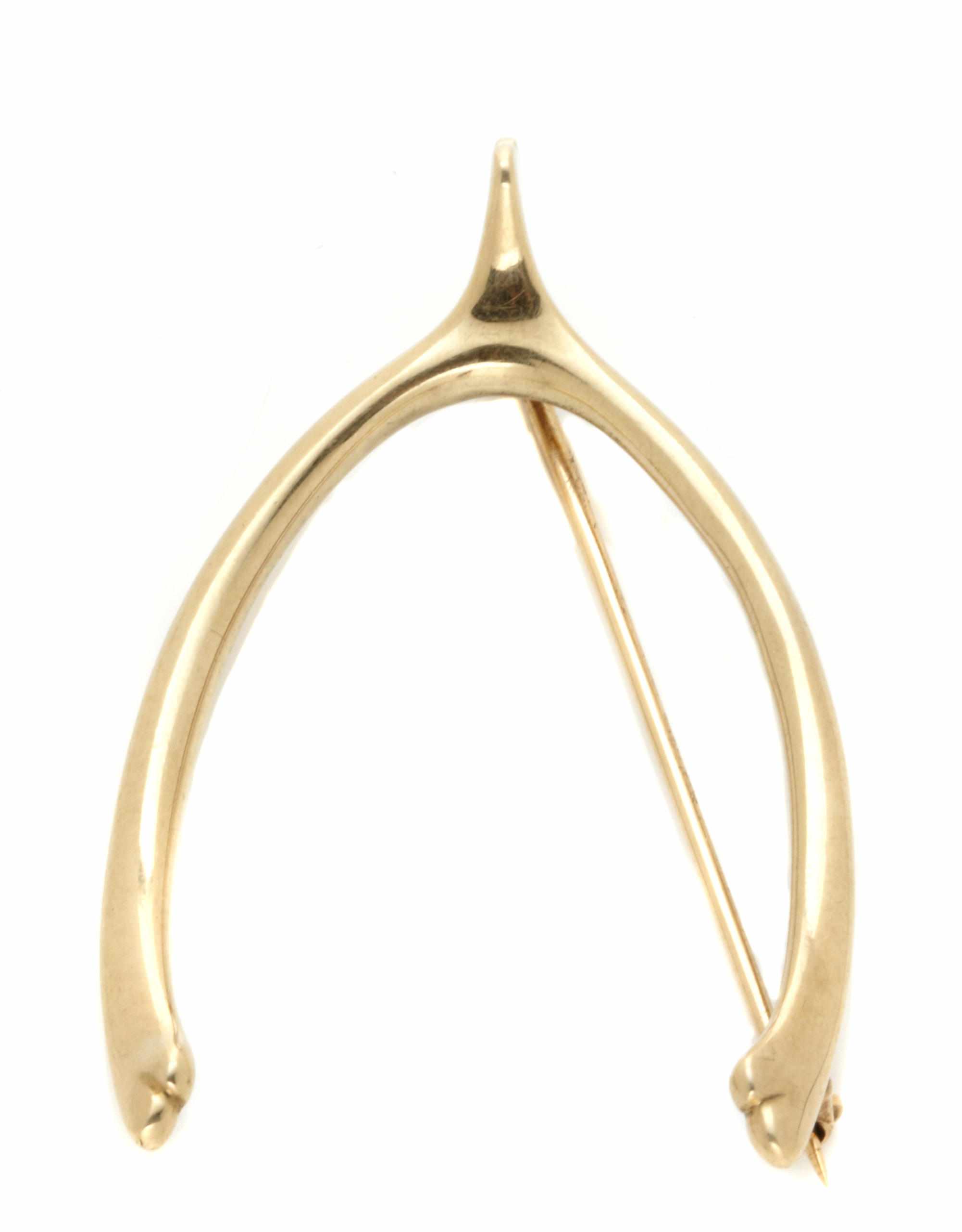 Appraisal: A k gold wishbone brooch Cartier signed Cartier dimensions x