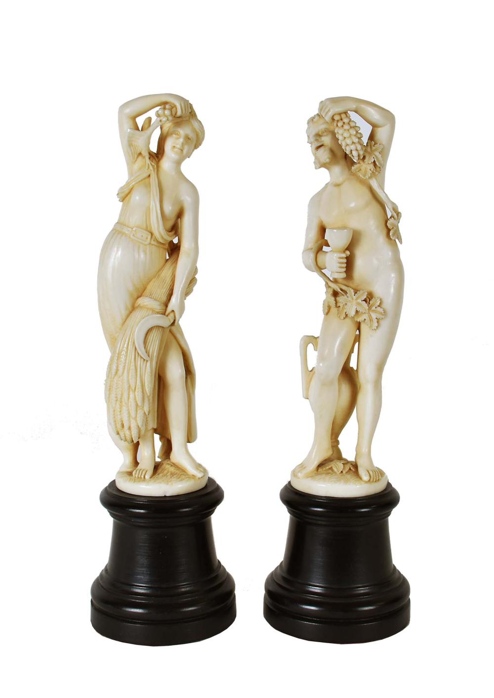 Appraisal: PAIR OF CONTINENTAL CARVED FIGURES OF CERES AND BACCHUSProbably German