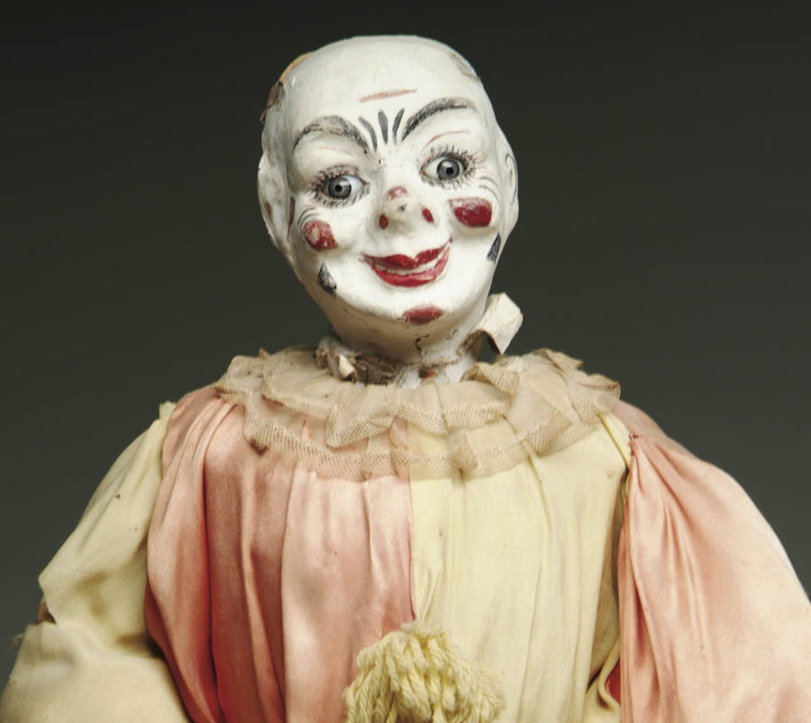 Appraisal: MECHANICAL NODDING CLOWN AUTOMATON cm With papier mache head blue