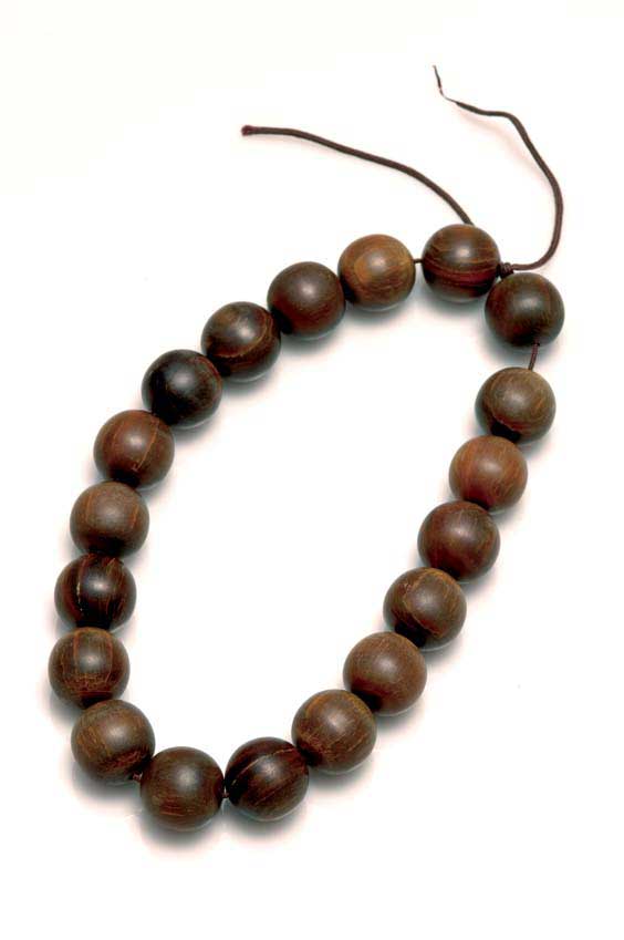 Appraisal: RHINO HORN BUDDHIST BEADS Strand of Chinese rhinoceros horn Buddhist